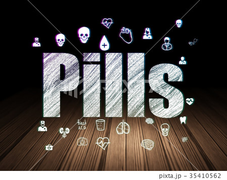 Medicine concept: Pills in grunge dark room Medicine concept: Pills in grunge dark room 35410562