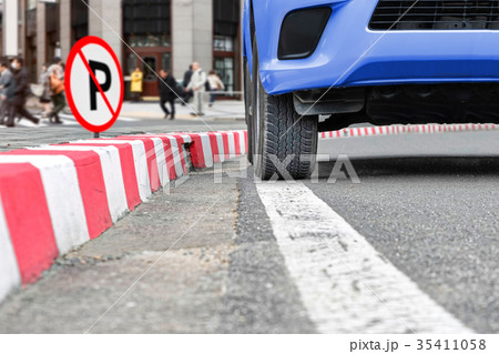 No parking sign at red stripes sign on street No parking sign at red stripes sign on street 35411058