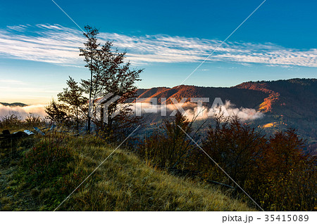 foggy sunrise in mountainous countryside 35415089