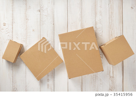 cardboard box on wooden background 35415956