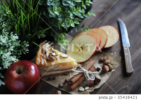 Delicious pastry with cinnamon and fruit Delicious pastry with cinnamon and fruit 35416421