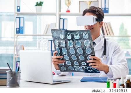 Doctor working with virtual VR reality glasses 35416913