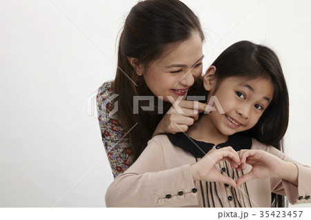happy mother and daughter happy mother and daughter 35423457