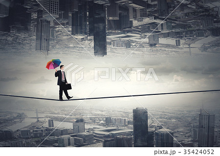 Man with colorful umbrella 35424052