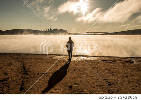 Beautiful woman standing lake of two rivers Beautiful woman standing lake of two rivers 35428058