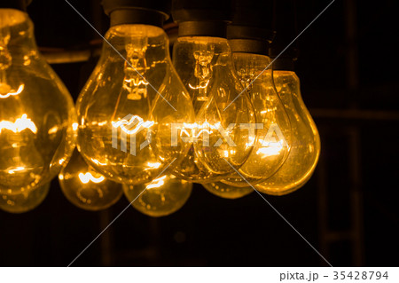 vintage light bulbs  in the night with copyspace 35428794