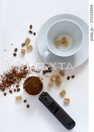 Ingredients for coffee: ground coffee in the horn Ingredients for coffee: ground coffee in the horn 35430906