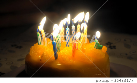 Orange cake celebrate birthday Colorful candle Orange cake celebrate birthday Colorful candle 35433177