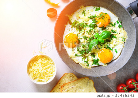 Sunny morning. Breakfast with fried eggs in pan Sunny morning. Breakfast with fried eggs in pan 35436243