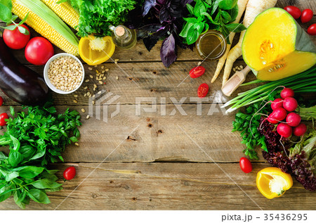 Vegetables on wooden background. Herbs, basil 35436295