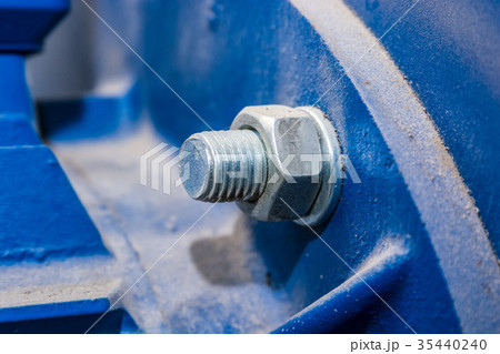Close up metal nut on bolt Close up metal nut on bolt 35440240