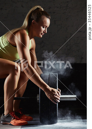 Female crossfit athlete exercising Female crossfit athlete exercising 35446525