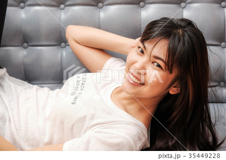 Portrait of asian women lying on sofa 35449228