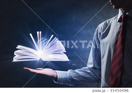 Book in hand Book in hand 35450496