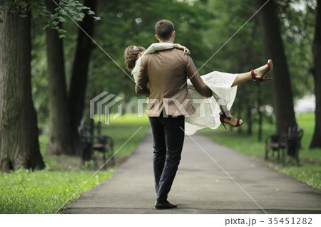 Wedding dance in the park of young bride and groom Wedding dance in the park of young bride and groom 35451282