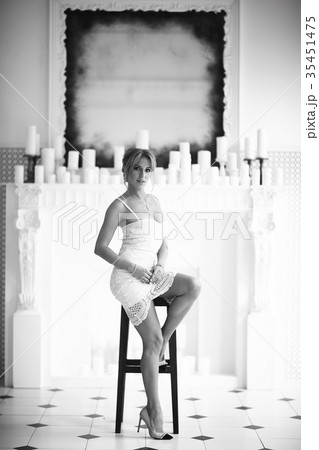 Bride in a white dress at a wedding is beautifully solemn 35451475