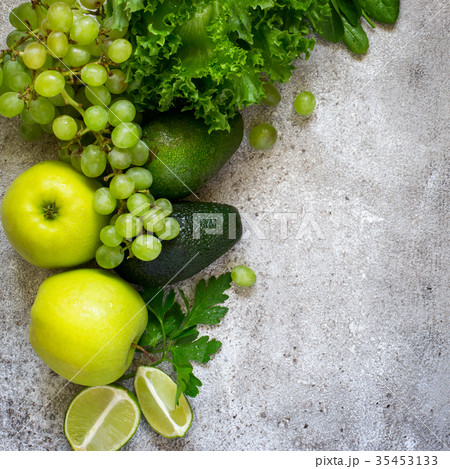 Selection of green vegetables and fruits  35453133
