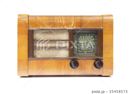 Old wooden radio isolated on white Old wooden radio isolated on white 35458573