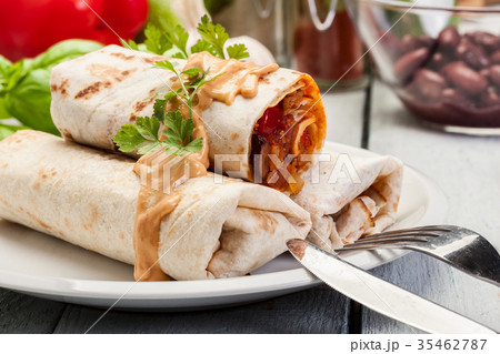 Mexican burritos wraps with mincemeat 35462787