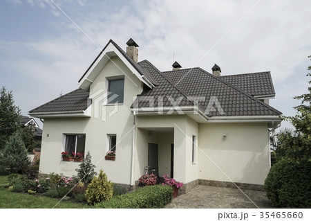 New house with a garden in a rural area New house with a garden in a rural area 35465660