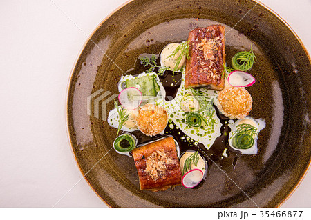 The eel glazed in kvass with croquet from cottage The eel glazed in kvass with croquet from cottage 35466877