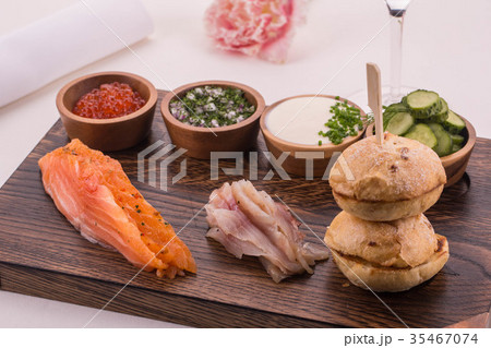 The fresh-salted whitefish and a salmon with red o 35467074