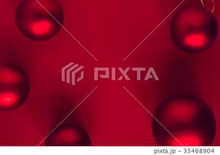 Red Christmas balls on red  background 35468904