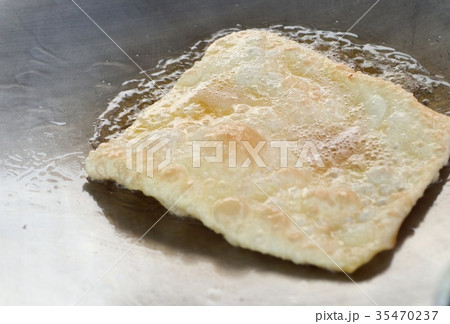 Making of dessert sweet roti 35470237
