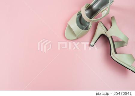 Biege high heel on pink background, Top view 35470841