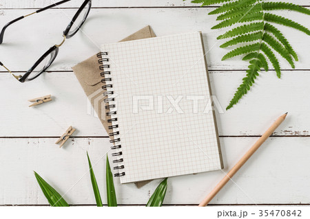 Blank notebook with green leaves Blank notebook with green leaves 35470842