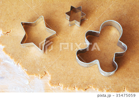 Gingerbread cookie dough and cookie cutters 35475059