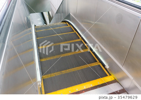 Escalator in metro. Moving up staircase. escalator 35479629