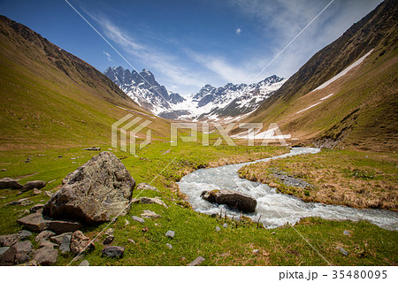 Summer landscape with river and mountain snow peak Summer landscape with river and mountain snow peak 35480095