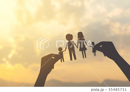 silhouette hand holding paper of family 35485731