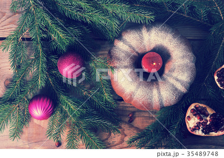 new year's background - a cupcake with a candle new year's background - a cupcake with a candle 35489748