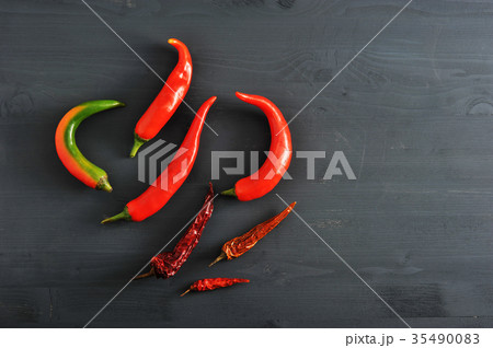 Chilli peppers - fresh peppers and dried pods Chilli peppers - fresh peppers and dried pods 35490083