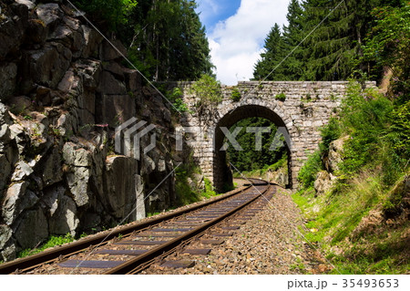 Romantic stone bridge over railway in forest 35493653