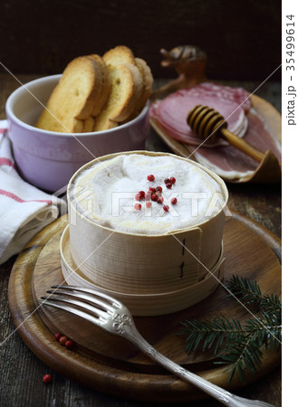 Vacherin Mont d'Or cheese and cold cuts for fondue Vacherin Mont d'Or cheese and cold cuts for fondue 35499614