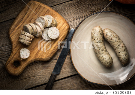 Sliced tasty white sausage. 35500383