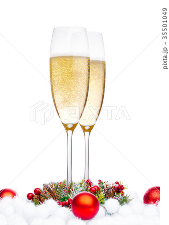 Champagne glasses with christmas decoration Champagne glasses with christmas decoration 35501049