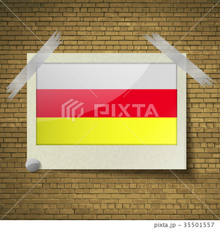 Flags North Ossetiaat frame on a brick background. Flags North Ossetiaat frame on a brick background. 35501557