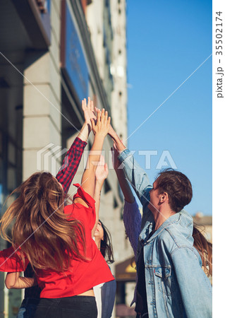 Happy young friends teamwork. Happy young friends teamwork. 35502174