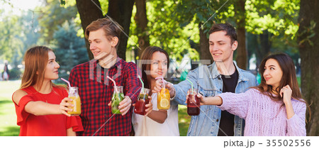 Healthy nutrition. Friends drinking detox tea Healthy nutrition. Friends drinking detox tea 35502556