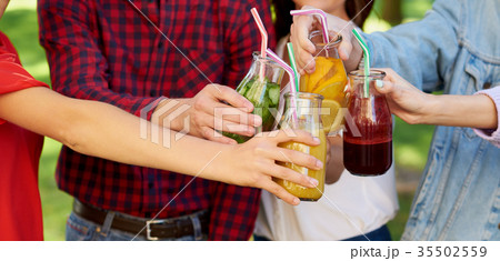 Healthy nutrition. Friends drinking detox tea Healthy nutrition. Friends drinking detox tea 35502559