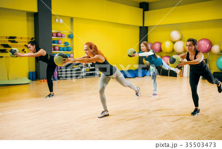 Women group with balls in motion, fitness workout Women group with balls in motion, fitness workout 35503473
