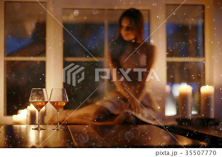 Girl adult evening candles romance holiday christmas home portrait Girl adult evening candles romance holiday christmas home portrait 35507770