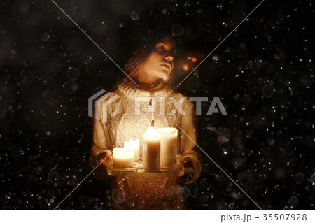 Girl adult evening candles romance holiday christmas home portrait Girl adult evening candles romance holiday christmas home portrait 35507928