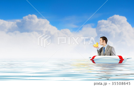 Businessman with duck 35508645