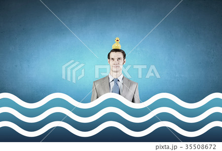 Businessman with duck 35508672