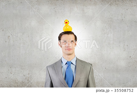 Businessman with duck Businessman with duck 35508752